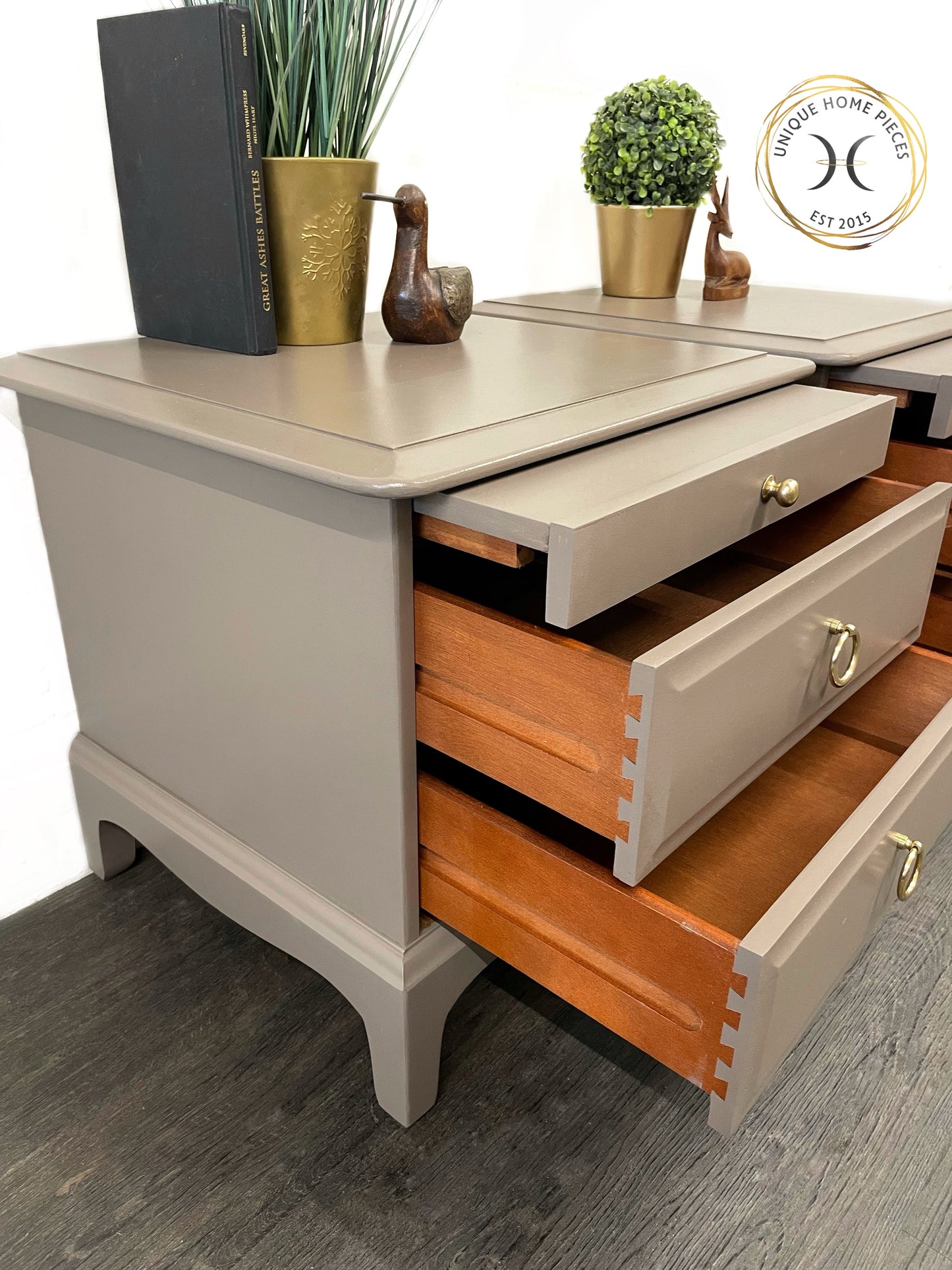 Pair of Stag Minstrel Two Drawer/Pullout Shelf Bedside Cabinets.