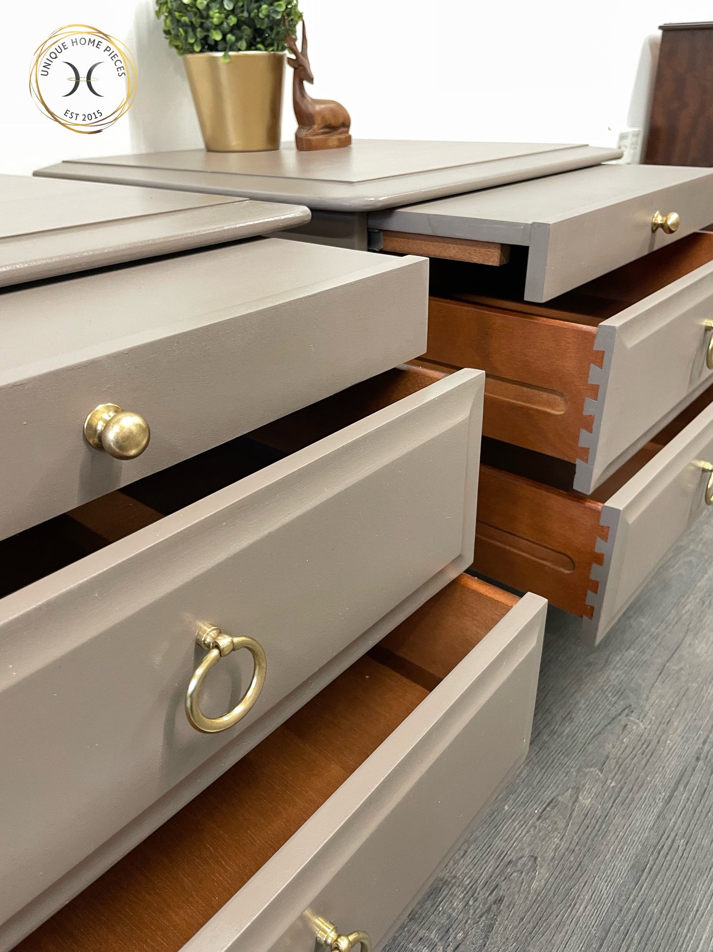 Pair of Stag Minstrel Two Drawer/Pullout Shelf Bedside Cabinets.