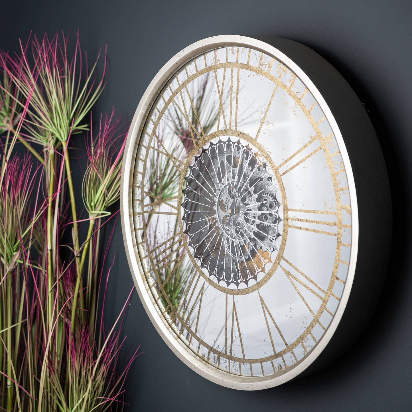 Mirrored Round Clock With Moving Mechanism - Unique Home Pieces