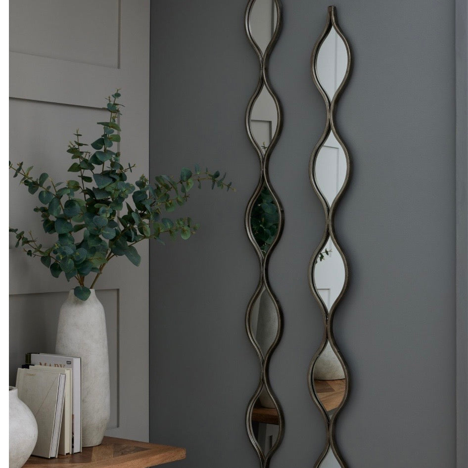 Decorative hanging antique distressed silver mirror. 5 small oval shaped mirrors encased by metal silver edging, ideal to hang singulary or in groups of 2-3 for inpact. Height 146 cm depth 2 cm width 13 cm £52 each