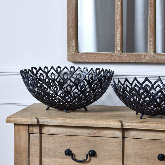 This is the Black Cast Large Lattice Bowl. A perforated aluminum display bowl with striking, contemporary pattern. This matt black item is sure to add instant impact wherever it's placed. Pair this vase with the smaller sized version in complementary pattern for a tiered height display.

Dimensions in cm H20 X W47 X D47

Material - Aluminium 