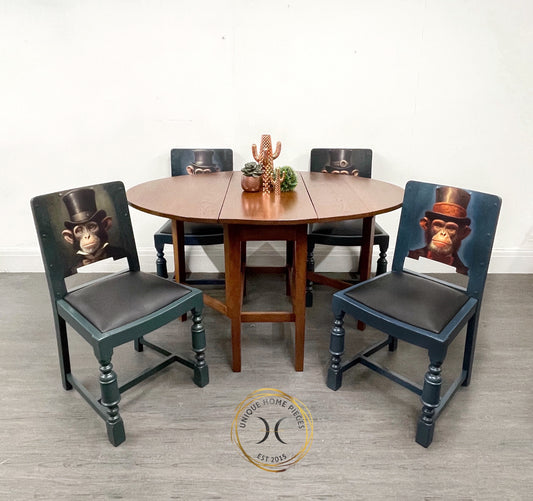 Oak Drop Leaf Dining Table and 4 Monkey Design Chairs