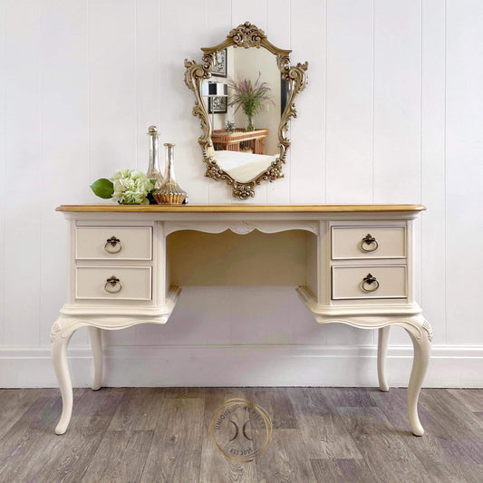 Willis and Gambier cream dressing table or desk made of poplar solid wood and veneers. stands on curvy Queen Anne Style legs two drawers sitting either side of the kneehole. the top is has been left in its natural light wood and satin varnished for protection. 
